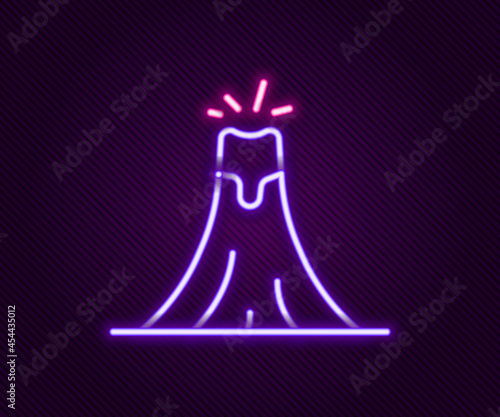 Glowing neon line Volcano eruption with lava icon isolated on black background. Colorful outline concept. Vector