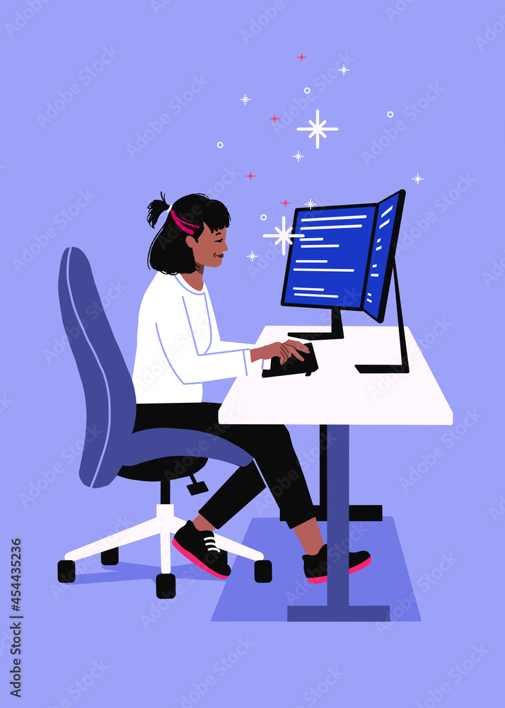 Software engineering sitting by computer.  two monitors on desk.  female software developer coding in front of screen.  computer science programmer typing.  work from home remote tech.