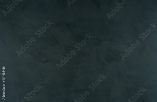 microcement decorative surface continuous smooth texture cement coating, background of beton cire dark blue
