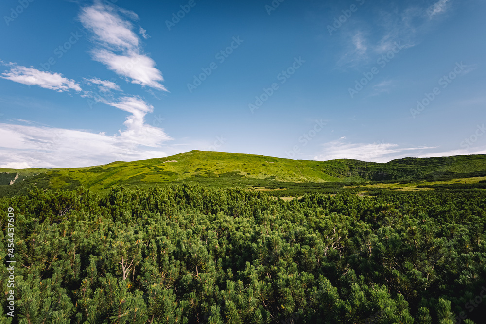 beautiful landscape of mountains. walks in the mountains. meeting of mountains with the sky