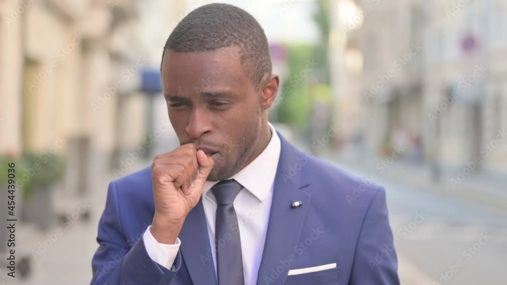 Outdoor Sick African Businessman Coughing Outdoor Sick African Businessman Coughing