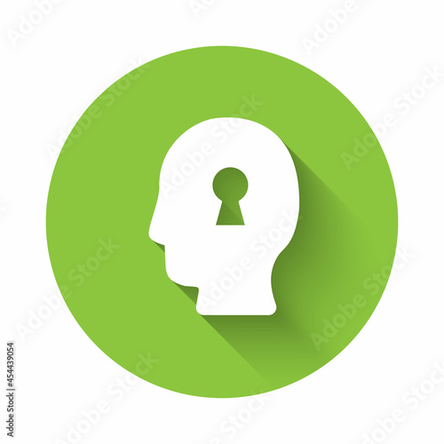 White Solution to the problem in psychology icon isolated with long shadow background. Key. Therapy for mental health. Green circle button. Vector