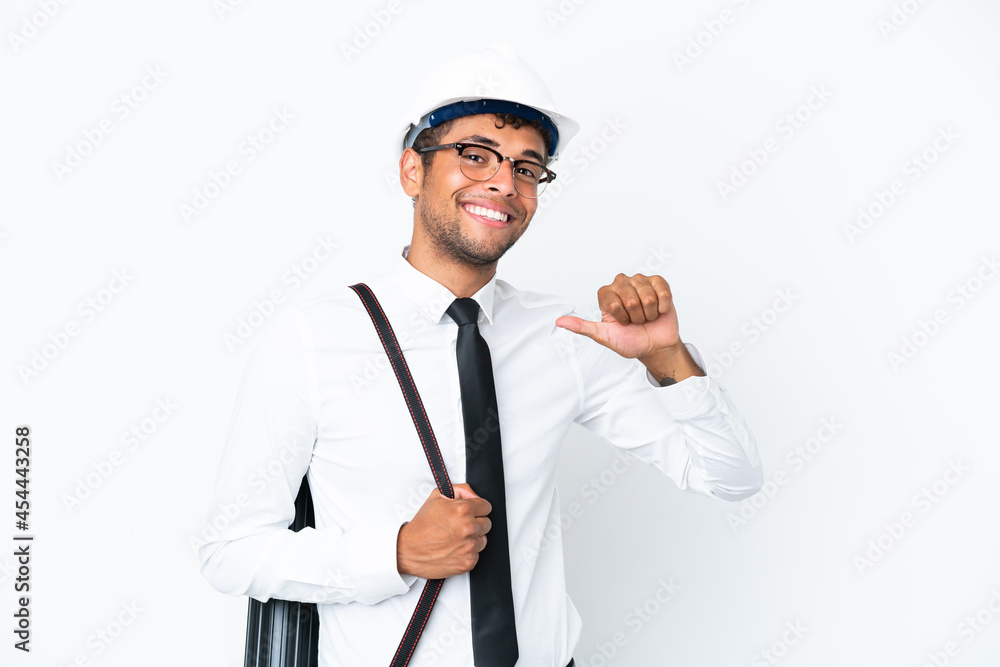 Architect brazilian man with helmet and holding blueprints proud and self-satisfied Architect brazilian man with helmet and holding blueprints proud and self-satisfied