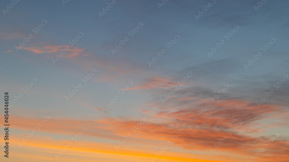 A beautiful sunrise with blue and orange tone.
