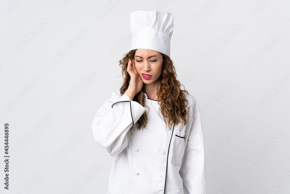 Young chef woman isolated on white background with headache Young chef woman isolated on white background with headache