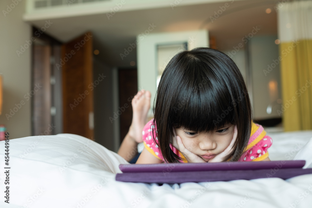kid watching tablet, child addicted cartoon kid watching tablet, child addicted cartoon