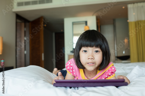 kid watching tablet, child addicted cartoon © waranyu