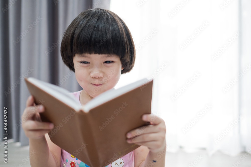 child reading book, education concept, home school
child reading book, education concept, home school