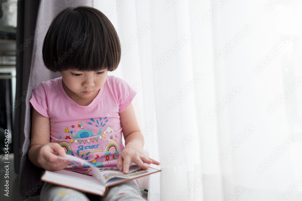 child reading book, education concept, home school
child reading book, education concept, home school