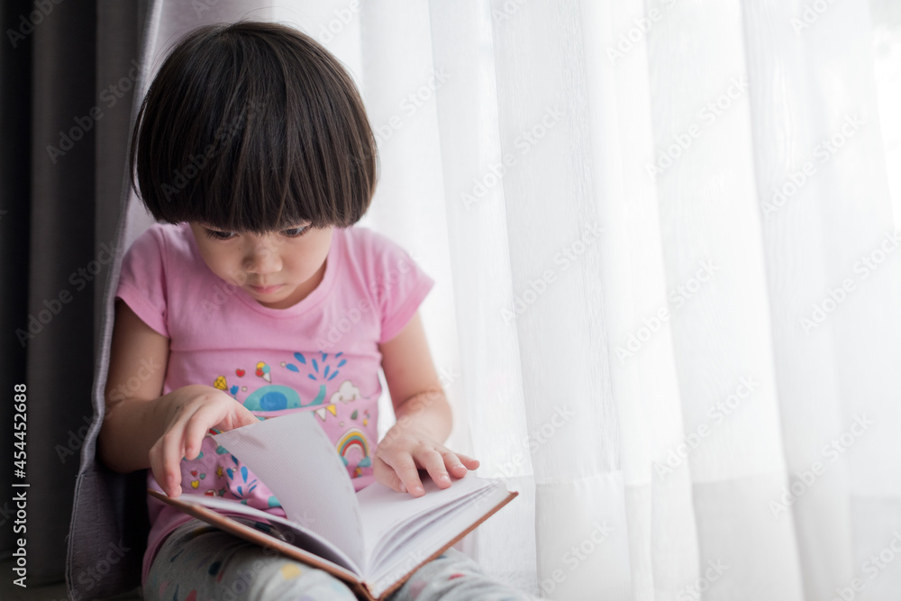 child reading book, education concept, home school
child reading book, education concept, home school