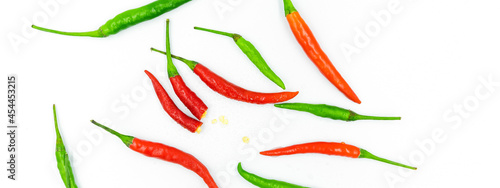 red and green chili on white background, pepper, paprika 