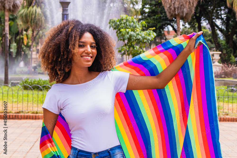 Beautiful African American Lesbian Woman With Lgbt Rainbow Flag In The