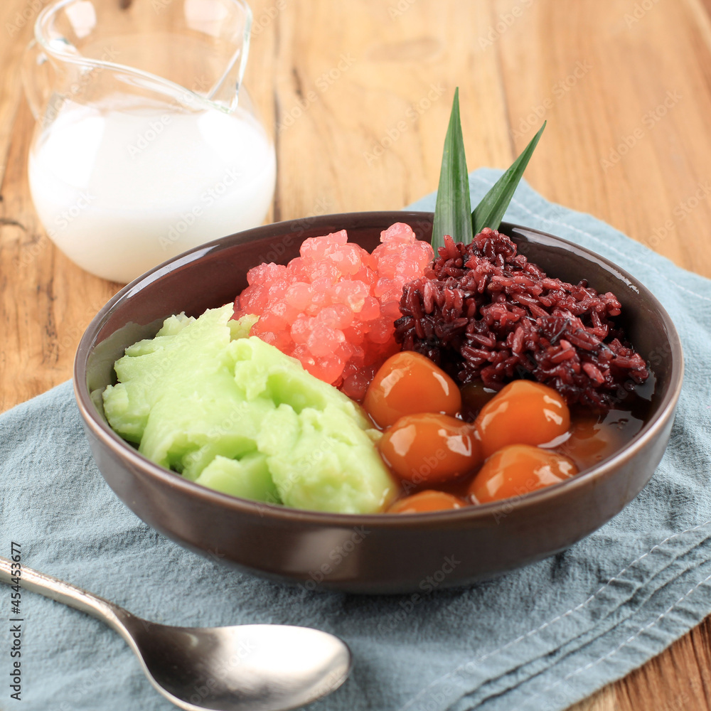 Bubur Campur Madura or Maduranese Mix Porridge, with Various Ingredient. Popular in Indonesia during Fasting or Lebaran for Takjil Breakfasting. Bubur Campur Madura or Maduranese Mix Porridge, with Various Ingredient. Popular in Indonesia during Fasting or Lebaran for Takjil Breakfasting.