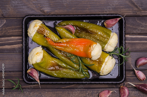 Baked green pepper stuffed with ricotta