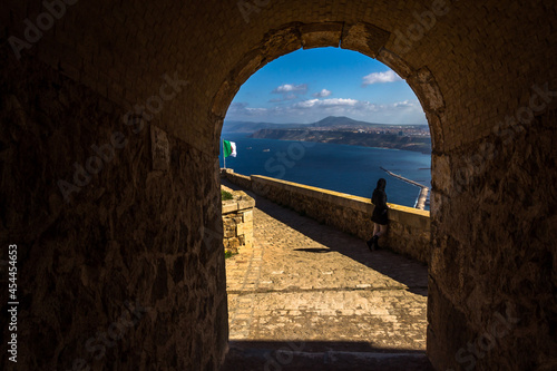 Lonely woman looking at the horizon at Fort Santa Cruz, one of the three forts in the city of Oran, the second largest port city of Algeria above the Gulf of Oran photo