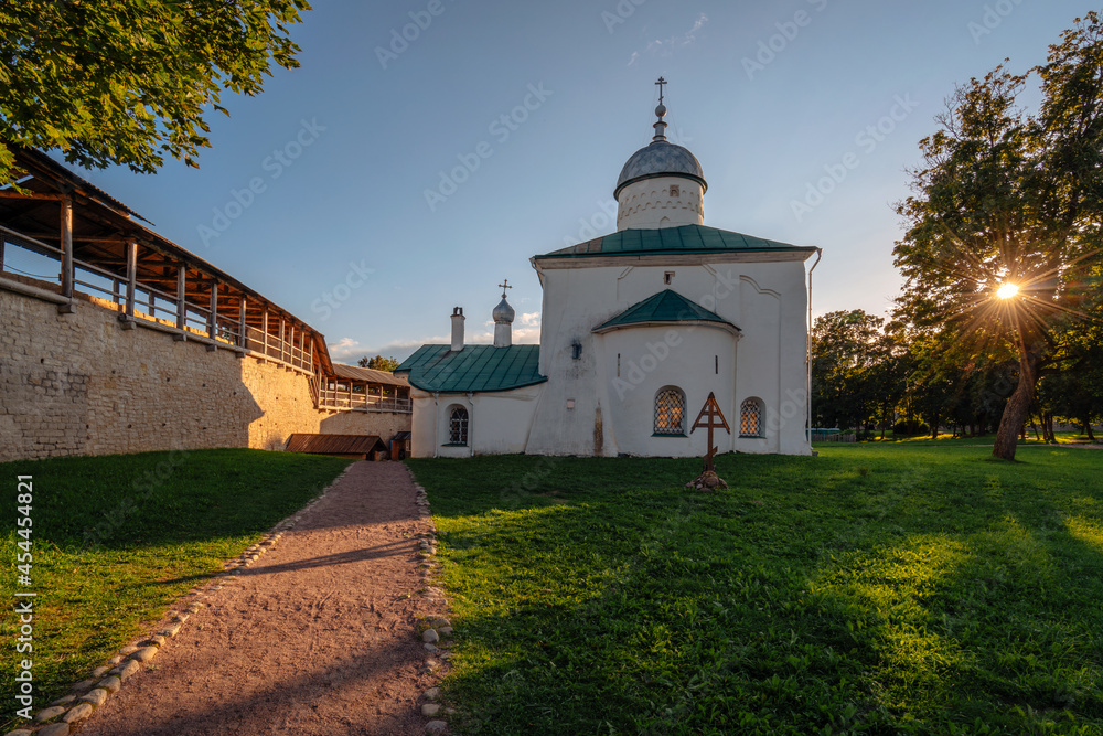 View of the St. Nicholas (Nikolsky) Cathedral on the territory of the Izborsk fortress (XIV-XVII centuries) on a sunny summer evening. Stary Izborsk, Pskov region, Russia