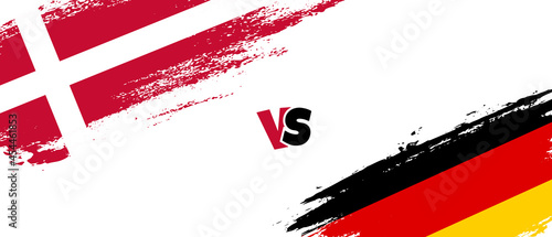 Creative Denmark vs Germany brush flag illustration. Artistic brush style two country flags relationship background