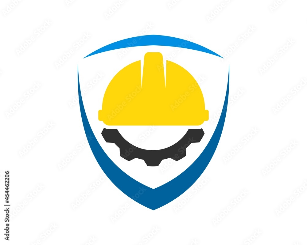 Abstract shield with safety helmet and gear inside Abstract shield with safety helmet and gear inside