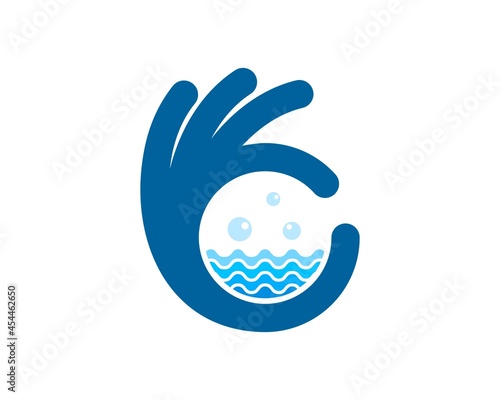 Hand OK with abstract water pattern inside
