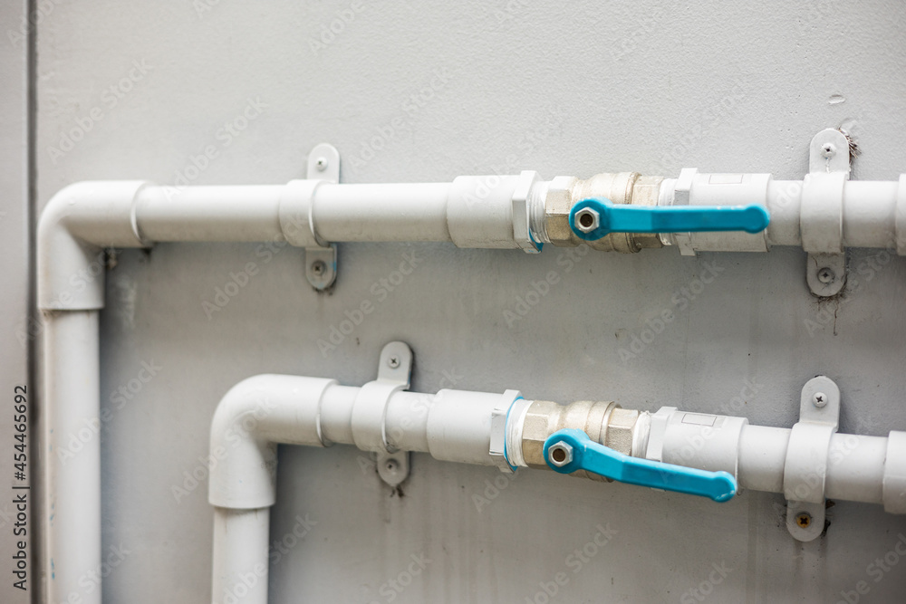 Household water supply system installed in the house. There are sewer pipes and clean water and faucets. Household water supply system installed in the house. There are sewer pipes and clean water and faucets.