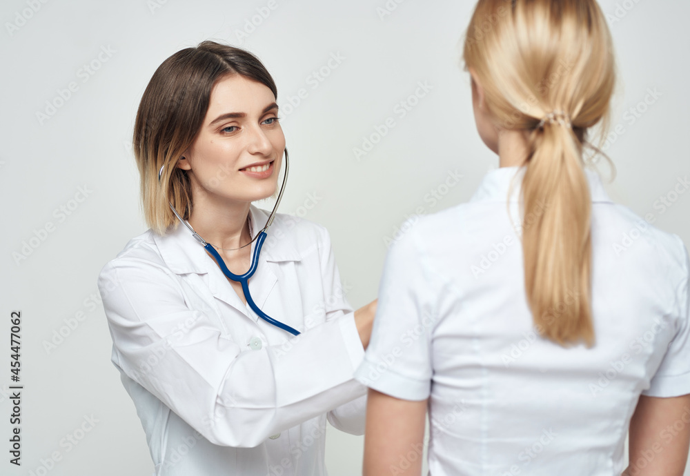 female doctor syringe in hand treatment light background female doctor syringe in hand treatment light background