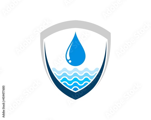 Abstract shield with water drop and beach wave inside