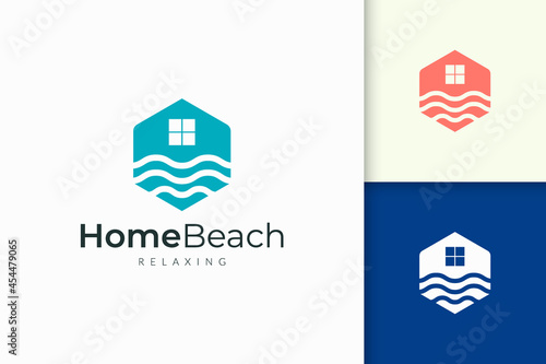 Obraz na plátně Home or resort logo in waterfront with abstract shape for real estate