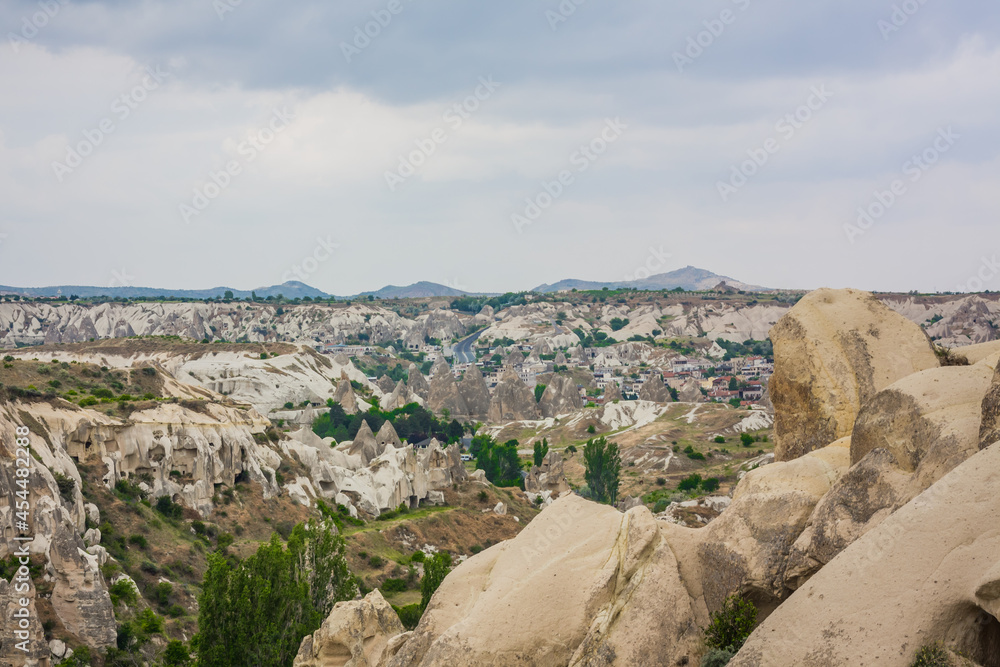 Amazing Volcanic rock formations known as Love Valley or Fairy Chimneys in Cappadocia, Turkey. Mushroom Valley one of attractions in Goreme National Park, Turkey. Mountains with rooms inside Amazing Volcanic rock formations known as Love Valley or Fairy Chimneys in Cappadocia, Turkey. Mushroom Valley one of attractions in Goreme National Park, Turkey. Mountains with rooms inside