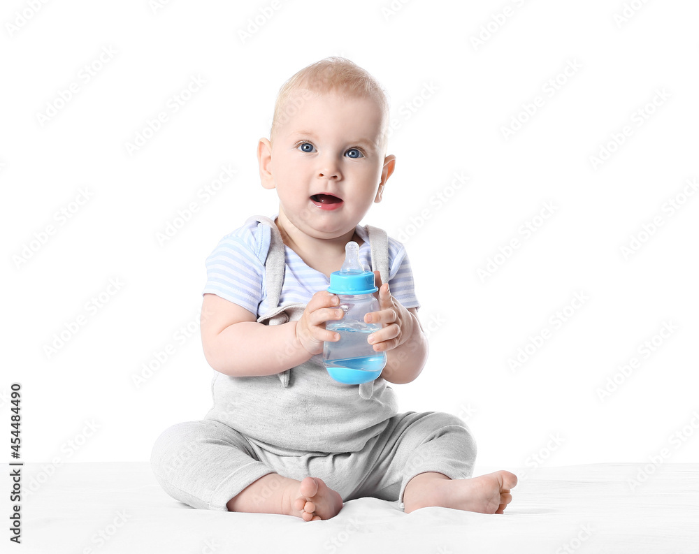 Cute little baby with bottle of water on white background Cute little baby with bottle of water on white background
