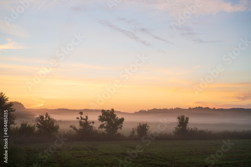 Misty morning sunrise over the field © Anders Mattson