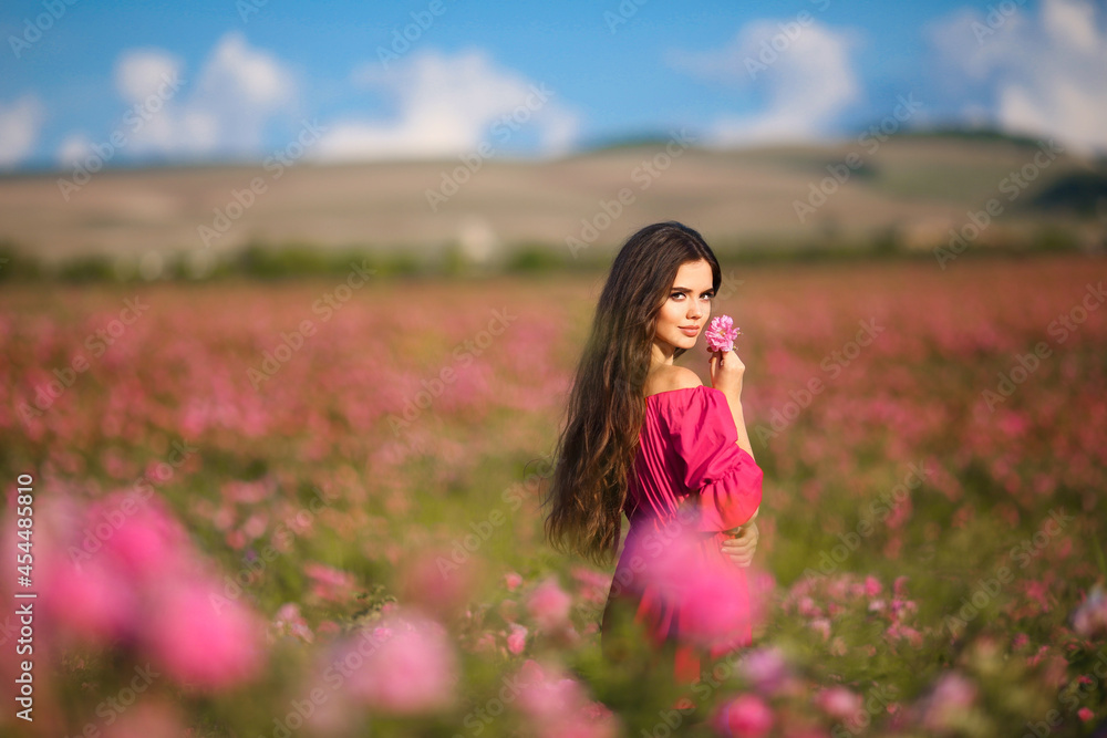 Beautiful young woman portrait. Carefree happy brunette with healthy wavy hair having fun outdoor in nature. Beautiful young woman portrait. Carefree happy brunette with healthy wavy hair having fun outdoor in nature.