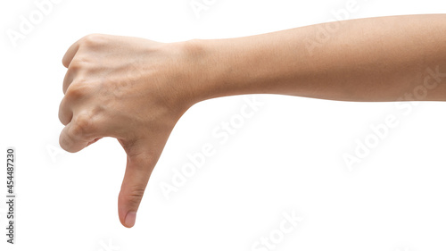 Woman hand showing thumbs down sign isolated on white background.