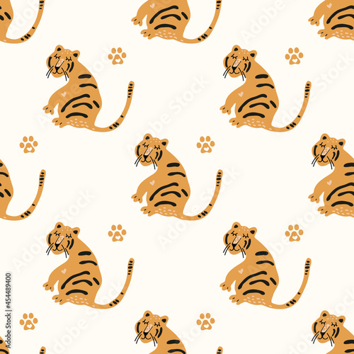 Vector hand-drawn seamless repeating color childish pattern with cute tigers in Scandinavian style. Print with wild animals. Jungle. Kids backgrounds