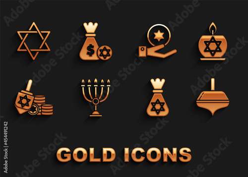 Set Hanukkah menorah, Burning candle in candlestick with star of david, dreidel, Jewish money bag, coin, hand, Star David and icon. Vector photo