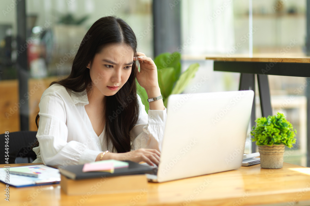 Pensive serious businesswoman, solving problem Pensive serious businesswoman, solving problem
