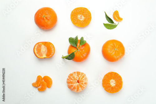 Flat lay with mandarins on white background