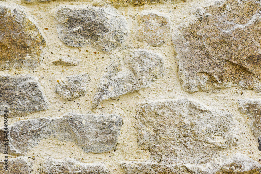 The texture of the wall, stones in the doggy space. The texture of the wall, stones in the doggy space.