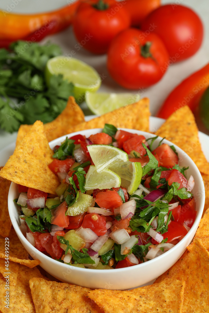 Mexican food concept with Pico de Gallo, close up Mexican food concept with Pico de Gallo, close up