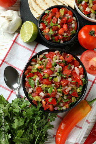 Mexican food concept with Pico de Gallo on white wooden table