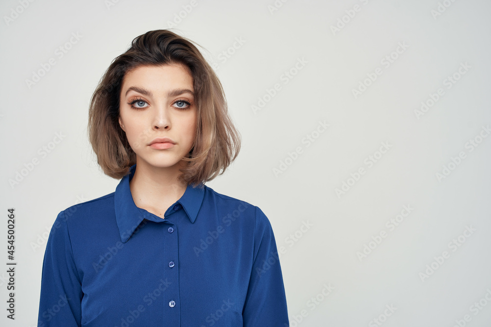 woman in blue shirt fashion posing elegant style