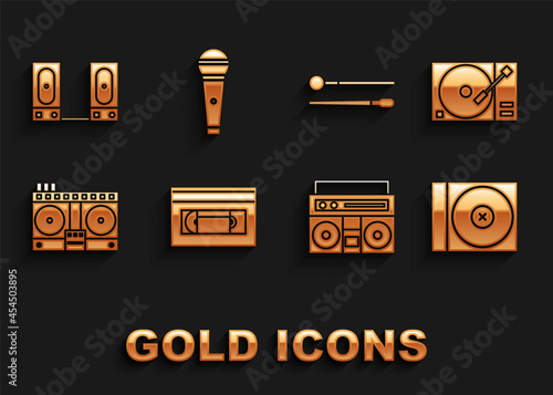 Set VHS video cassette tape, Vinyl player with vinyl disk, CD or DVD, Home stereo two speakers, DJ remote for playing and mixing music, Drum sticks, Stereo and Microphone icon. Vector