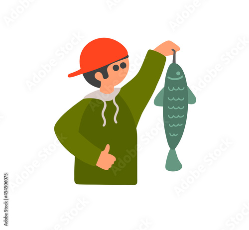 Young man fishman holding big fish. Lucky happy boy in red cap.