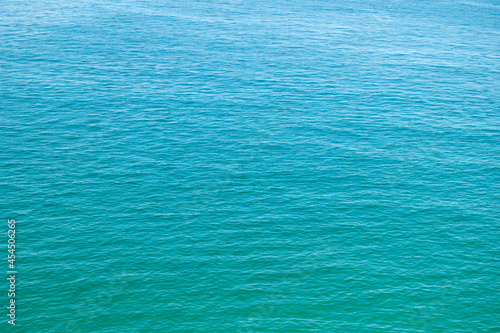 Turquoise water of the Atlantic Ocean. Background, wallpaper and design elements