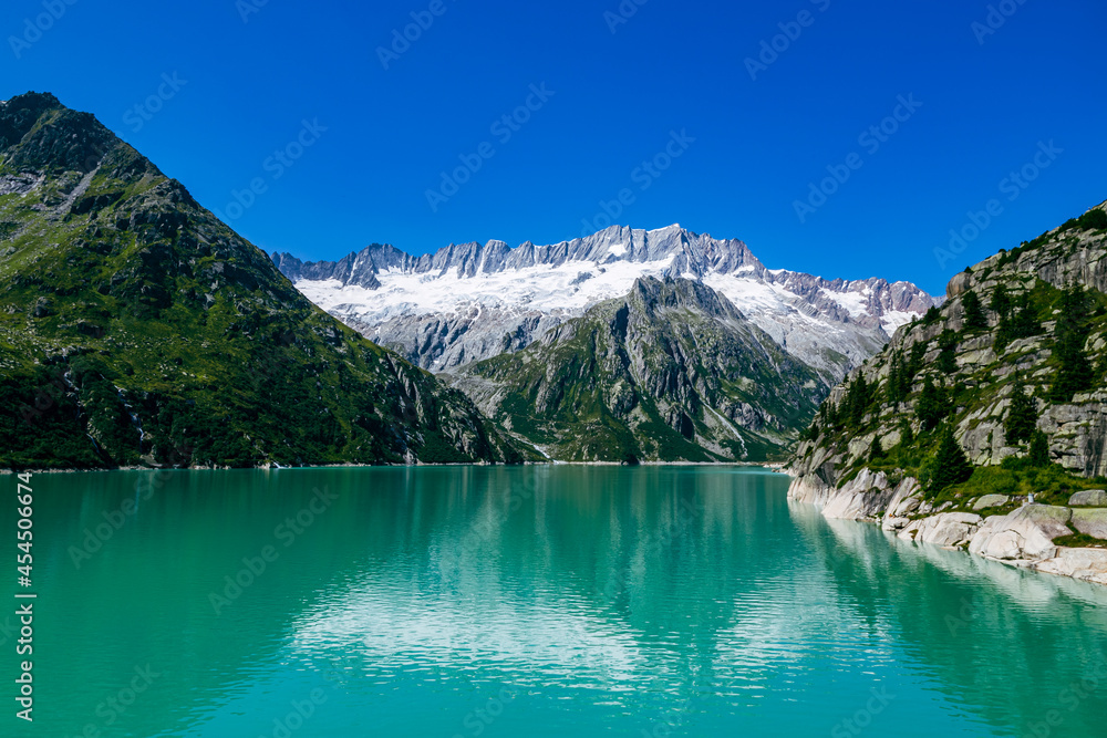 Mountain lake on sunny day, reservoir