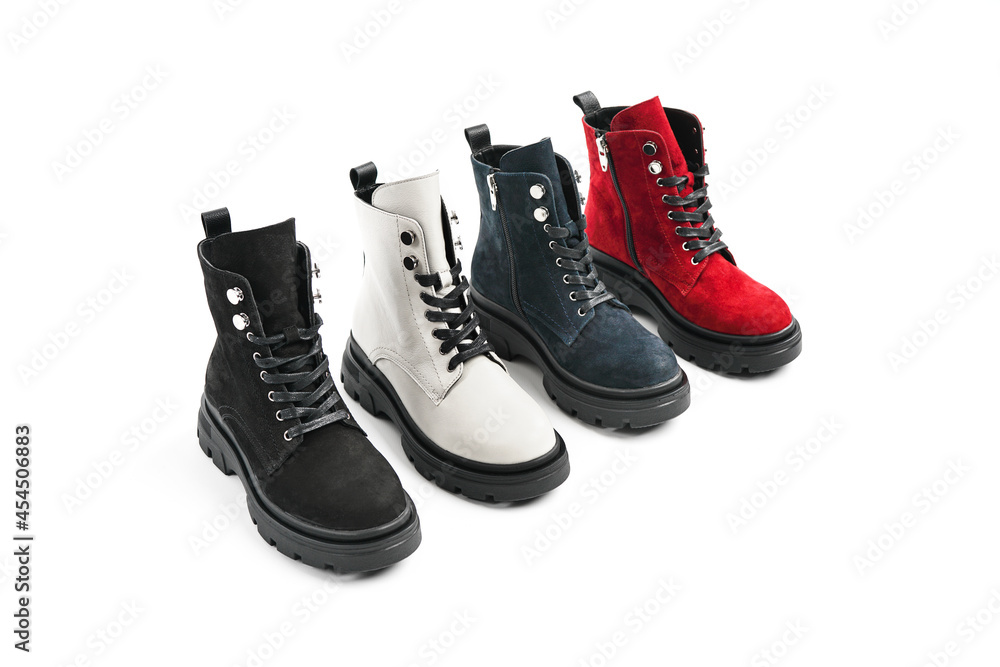 autumn fashion shoes red black white blue on a white background. filming a lookbook and a catalog for shoes. leather shoes for autumn autumn fashion shoes red black white blue on a white background. filming a lookbook and a catalog for shoes. leather shoes for autumn