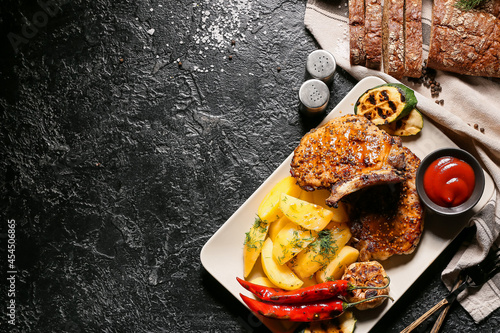 Plate with tasty pork steak...