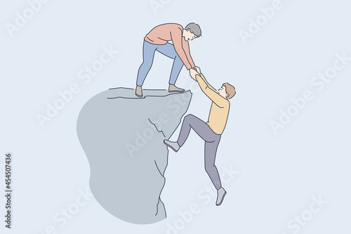 Helping hand and assistance concept. Young man standing on peak of rock giving hand to help his friend to climb up assisting working as team vector illustration 