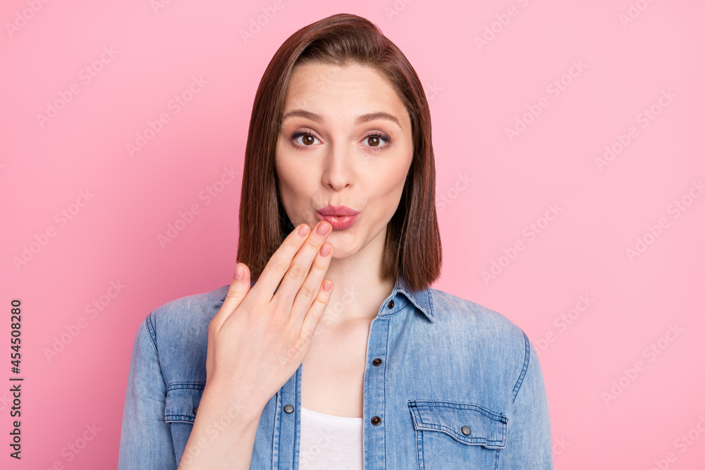 Photo portrait of girl in shirt made mistake isolated pastel pink color background Photo portrait of girl in shirt made mistake isolated pastel pink color background