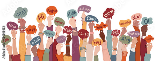 Tableau sur toile Many arms raised of diverse and multi-ethnic people holding speech bubbles with text -hallo- in various international languages