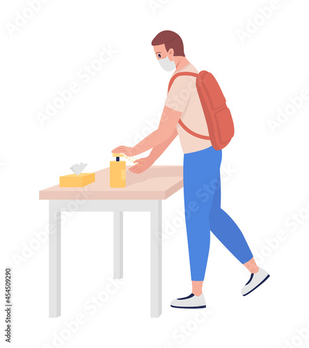 Teenage boy sanitizes his hands semi flat color vector character. Schoolboy figure. Full body person on white. New normal isolated modern cartoon style illustration for graphic design and animation